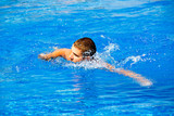 Man swims in the pool in Cyprus
