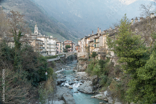 Chiavenna city with Mella river in the italian alps photo