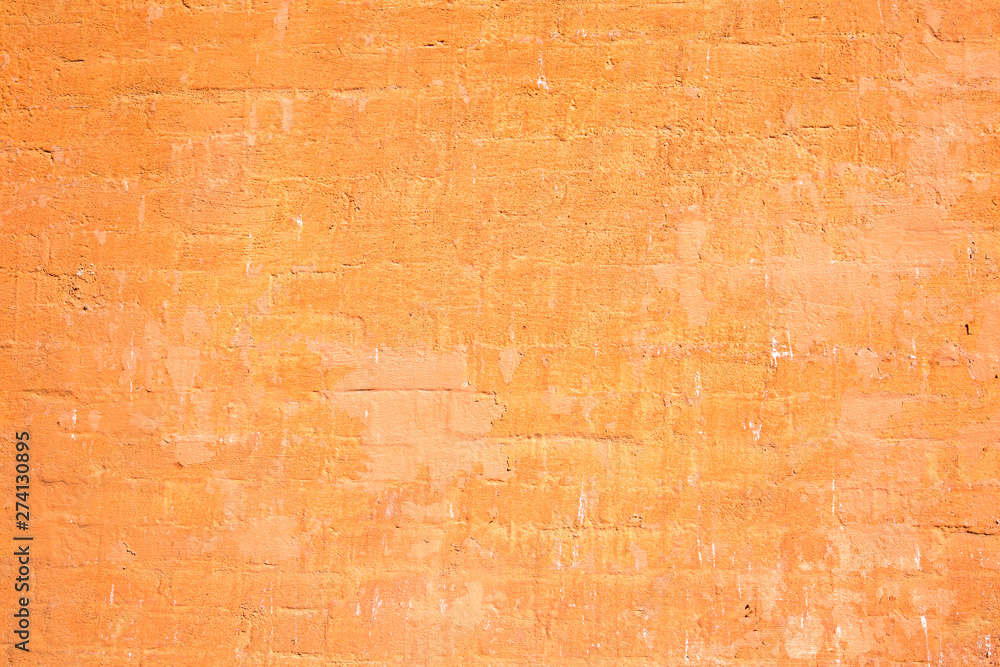 Naklejka premium Background of brick wall flaky yellow. Architecture design details construction.