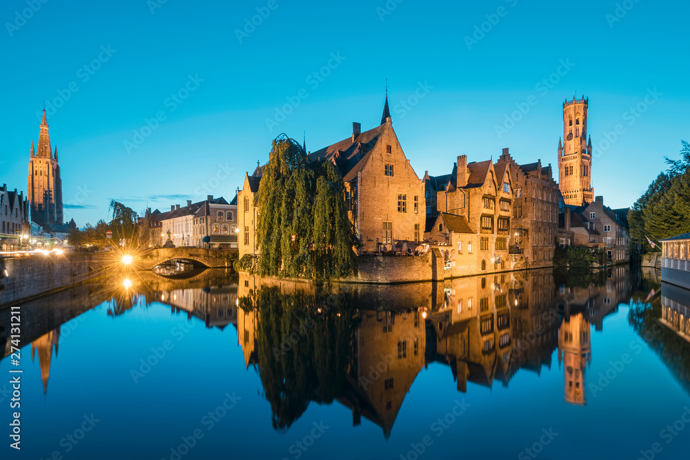 Bruges canals during the blue hour with reflections Bruges canals during the blue hour with reflections