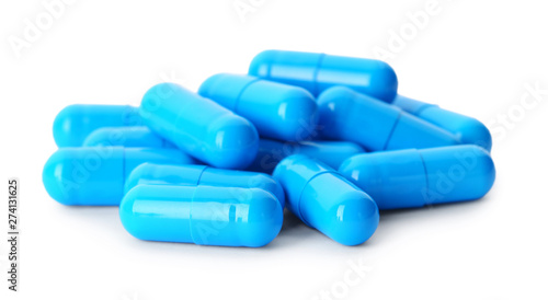 Pile of pills on white background. Medical treatment