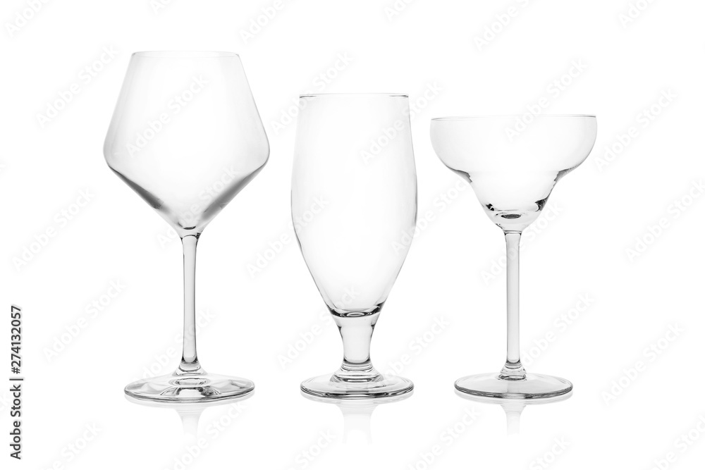 Set of empty glasses for different drinks on white background Set of empty glasses for different drinks on white background