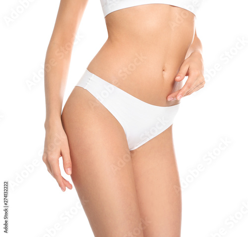 Slim young woman with smooth gentle skin on white background, closeup. Beauty and body care concept