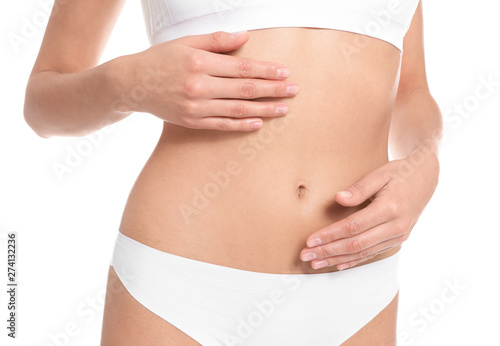 Slim young woman with smooth gentle skin on white background, closeup. Beauty and body care concept © New Africa