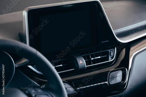 Car screen multimedia system. Interior detail. © Nana_studio