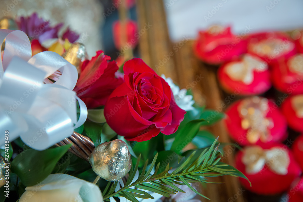 Fototapeta premium Red roses flowers with valentine festival and beautiful blur bouquet background . 8 marc . Very beautiful Red roses flowers . Soft box shot . Red rose flowers .