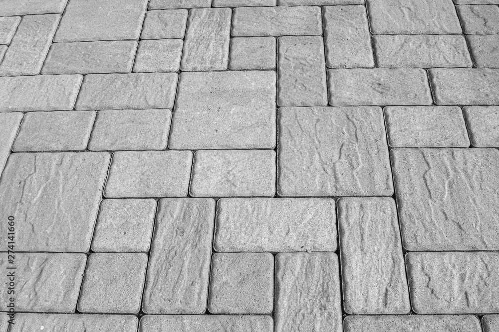 Obraz premium Black and white square blocks paving background