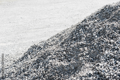 Side of gray gravel rock pile.