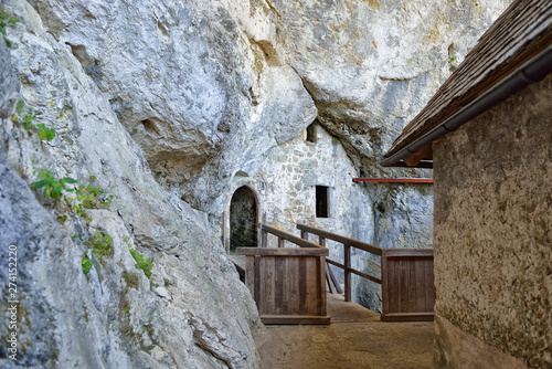 Cave under the castle Predjama in Slovenia photo
