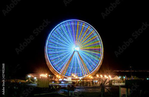 ferris wheel at night © Youcef Guellal