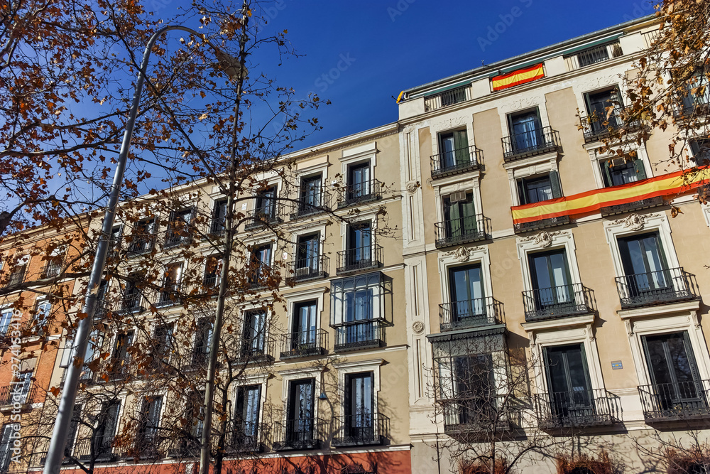 Facade of typical Buildings and streets in City of Madrid, Spain