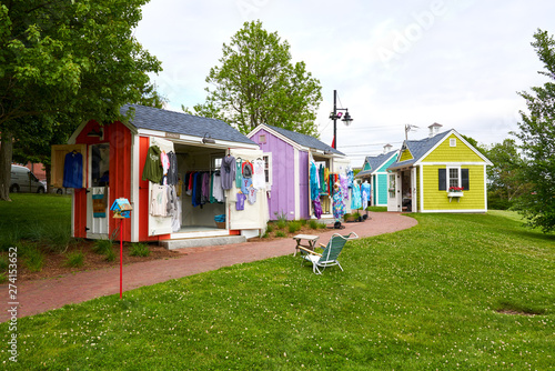 Upper Loop local artist shanties with clothing hanging on display in Hyannis, Massachusetts on Cape Cod photo