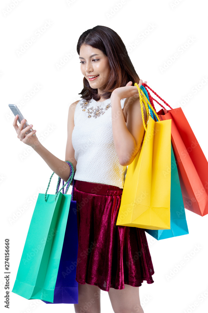 Happy woman in summer enjoying shopping holding smartphone and colorful shopping bag on white background, shopping concept, isolate concept. Happy woman in summer enjoying shopping holding smartphone and colorful shopping bag on white background, shopping concept, isolate concept.