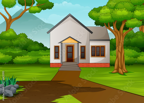 little house in beautiful landscape with green yard