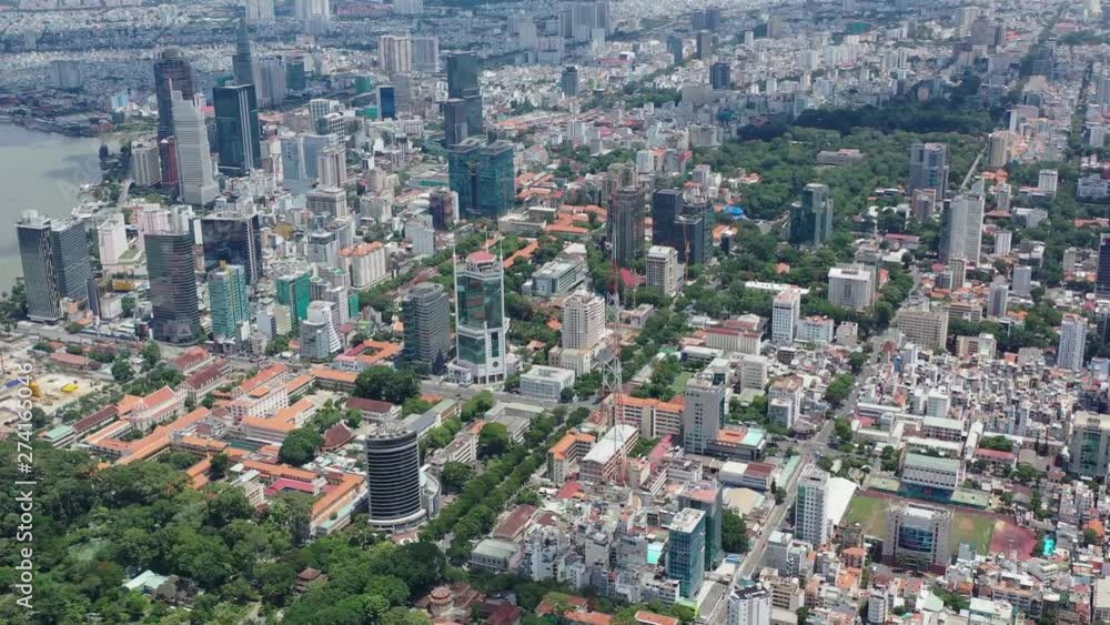 Aerial view of Downtown district of Ho Chi Minh City, aka Saigon, on sunset , including architectural landmark during daytime, South Vietnam Aerial view of Downtown district of Ho Chi Minh City, aka Saigon, on sunset , including architectural landmark during daytime, South Vietnam