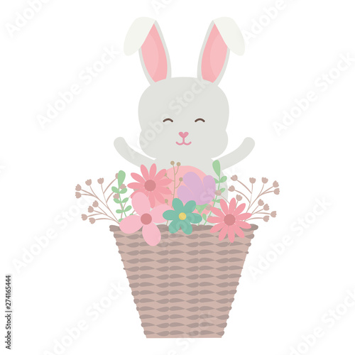 cute little rabbit with basket straw and flowers