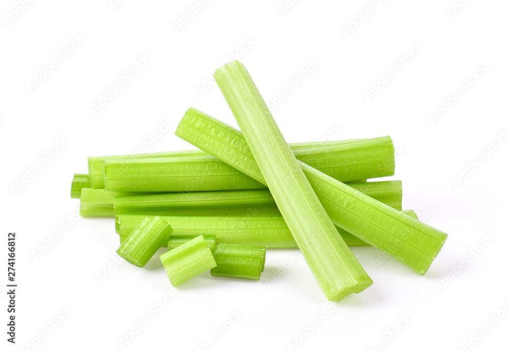 heap of sliced celery on white background. heap of sliced celery on white background.