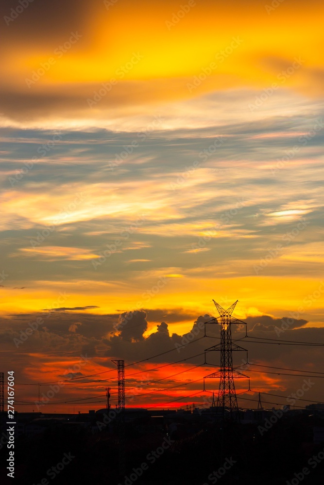 Obraz premium high voltage pole , silhouette , Sunset