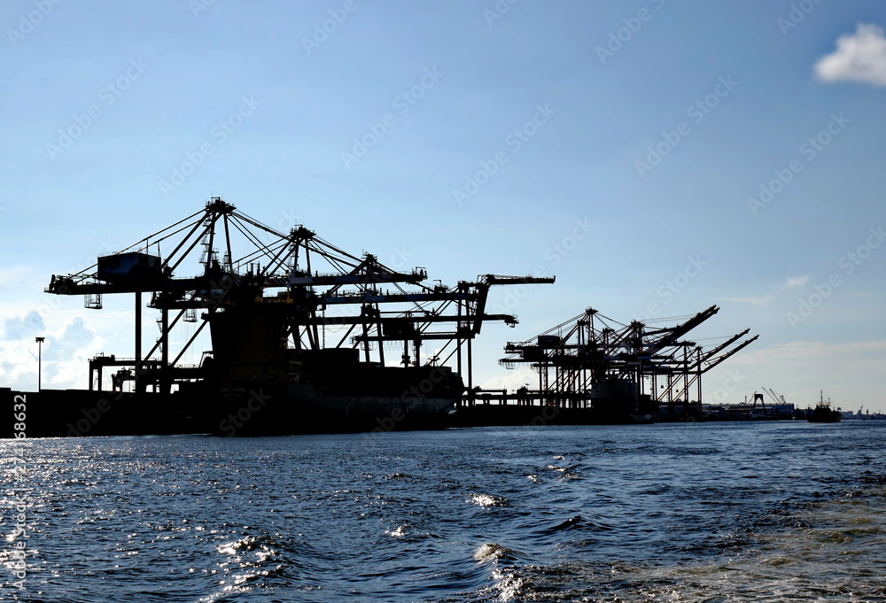 Large Container Cranes in Silhouette