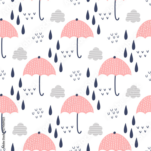 Seamless pattern with clouds, rain and umbrella.Vector design for wrapping paper, textile.