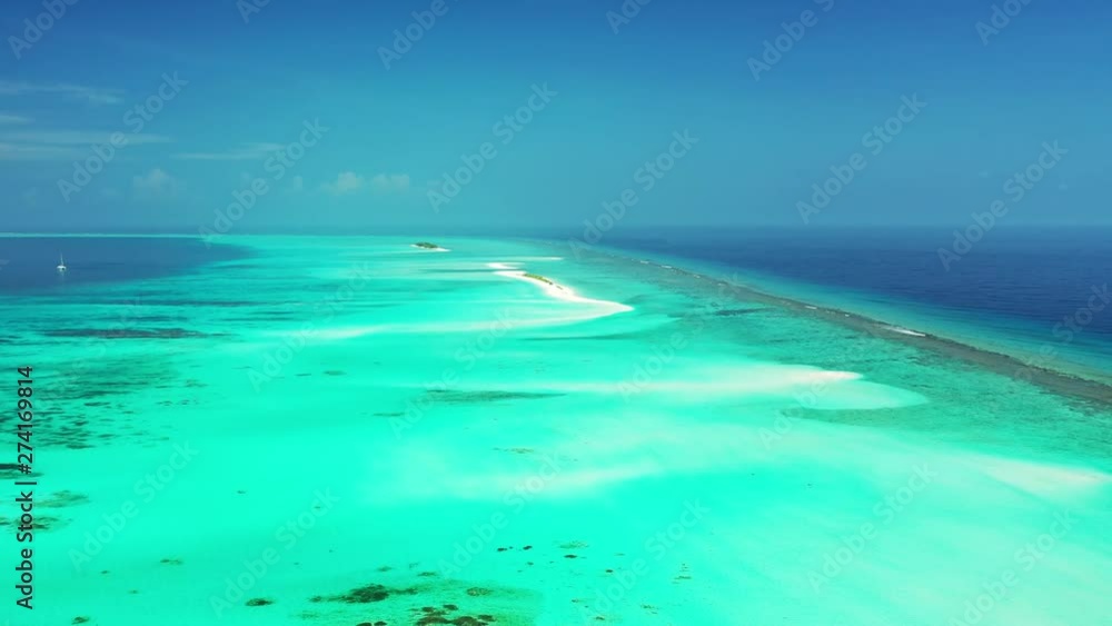 ocean with turquise color near tropics and rocks visible underwater drone aerial footage maldives ocean with turquise color near tropics and rocks visible underwater drone aerial footage maldives