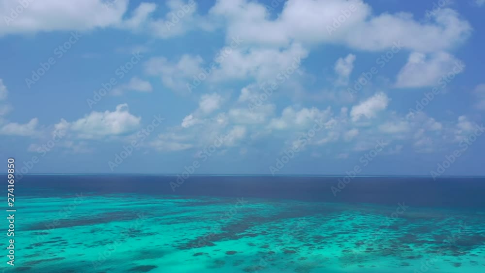 drone aerial shot of turquise ocean clean water with tropical islands around caribbean drone aerial shot of turquise ocean clean water with tropical islands around caribbean