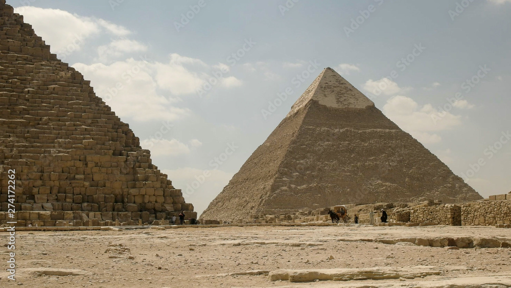 horse drawn carriage and the pyramid of khafre near cairo, egypt
