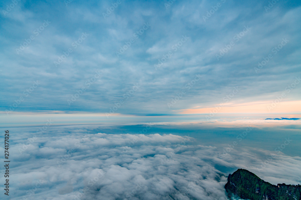 Peaks and seas of clouds under blue sky and white clouds, Emei Mountain, Sichuan Province, China Peaks and seas of clouds under blue sky and white clouds, Emei Mountain, Sichuan Province, China