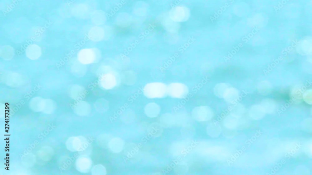 Slow Motion Blur Focus Blue Ripple Wave of Sea Water in Summer Slow Motion Blur Focus Blue Ripple Wave of Sea Water in Summer