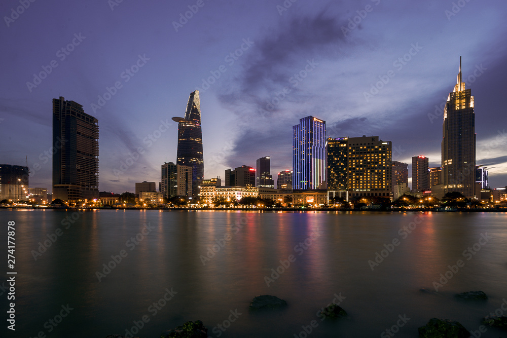 The best of night view in Ho Chi Minh City, Vietnam. Colorful of city light beside the Saigon river with skyline at sunset. Royalty high quality free stock image. The best of night view in Ho Chi Minh City, Vietnam. Colorful of city light beside the Saigon river with skyline at sunset. Royalty high quality free stock image.