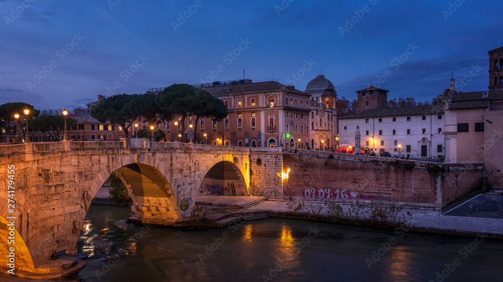 The Pons Cestius at sunset, Roman stone bridge in Rome, Lazio, Ital