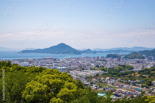 Matsuyama cityscape and gogoshima island ,Shikoku,Japan photo