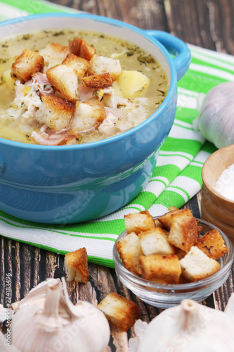 A bowl with traditional Czech garlic soup cesnecka photo