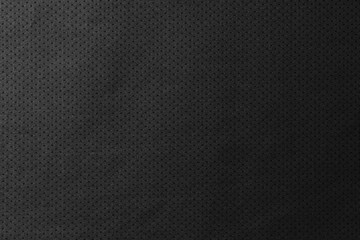 Black jersey texture background. Detail of luxury fabric surface.