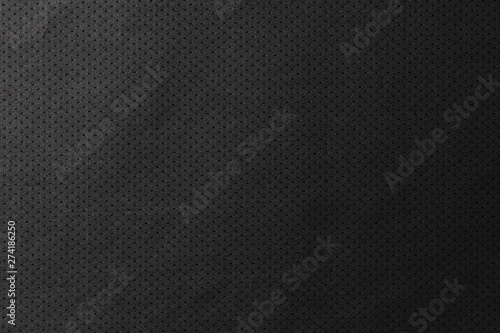 Black jersey texture background. Detail of luxury fabric surface.
