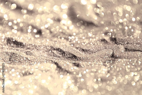 sparkling copper sand made of glitters - festal concept with bokeh texture - wonderful abstract photo background