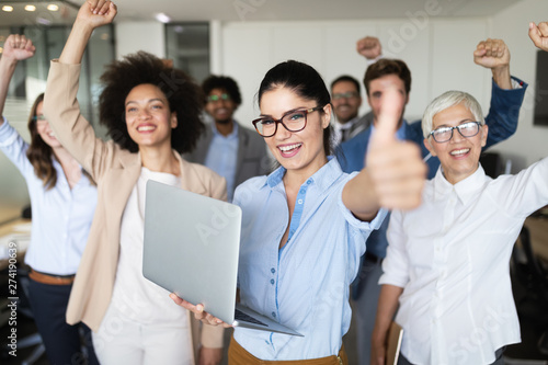 Group of successful business people in office