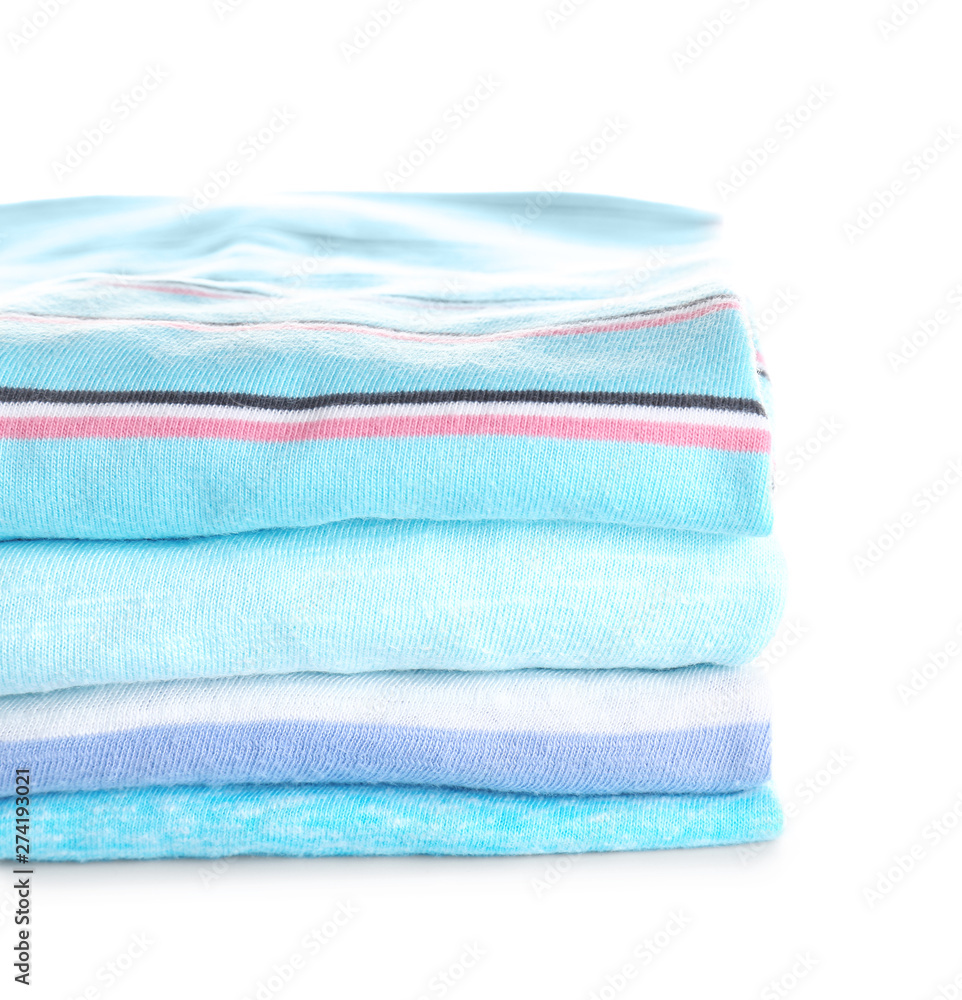 Stack of modern clothes on white background Stack of modern clothes on white background