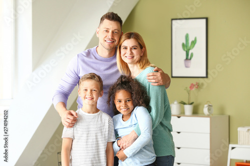 Happy couple with little ad...