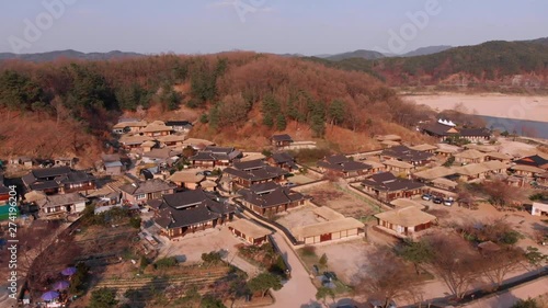 Fly in towards traditional Korean village photo