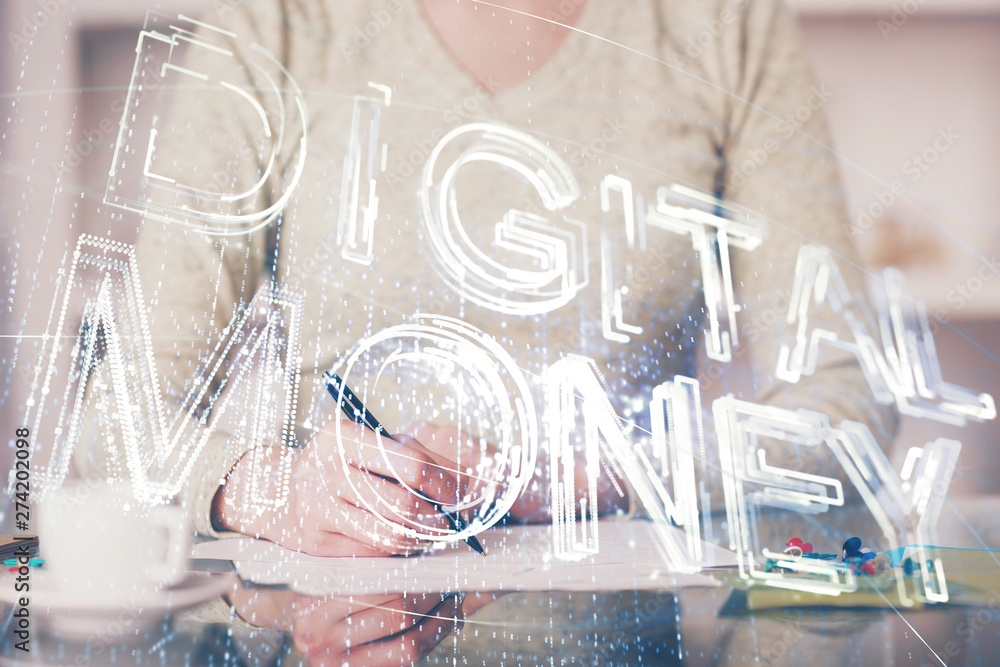 Cryptocurrency hologram over woman's hands writing background. Concept of blockchain. Multi exposure Cryptocurrency hologram over woman's hands writing background. Concept of blockchain. Multi exposure