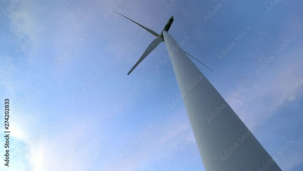 Single wind turbine spins around generating energy