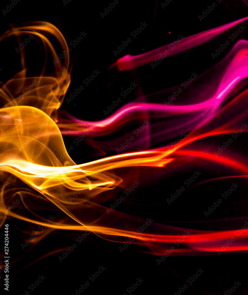 Obraz premium Colored smoke on black background