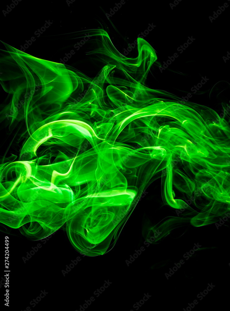 Green smoke on black background