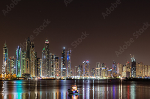 A peaceful view of Dubai Marina Skyline by night from the Oceana residence in Palm