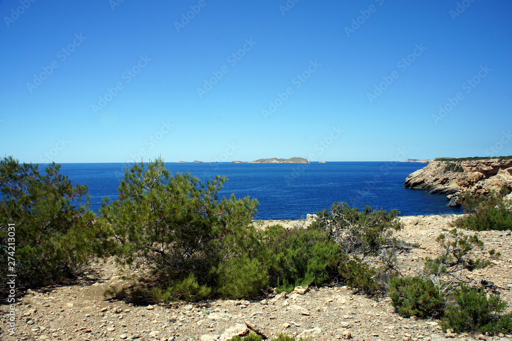 Landscapes of Ibiza.Uninhabited coast overlooking the island of Sa Conillera.Spain.