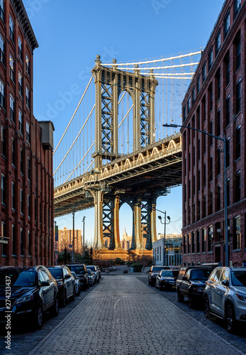 Manhattan Bridge from Washington street in DUMBO  a neighborhood in the New York City borough of Brooklyn .