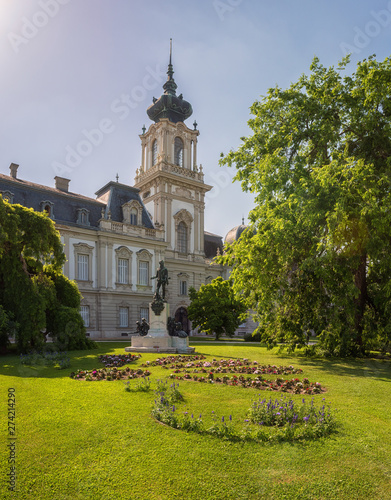 Festetics Palace with beautiful garden in summer, baroque architecture, Keszthely, Zala, Hungary. Outdoor travel background, vertical image photo