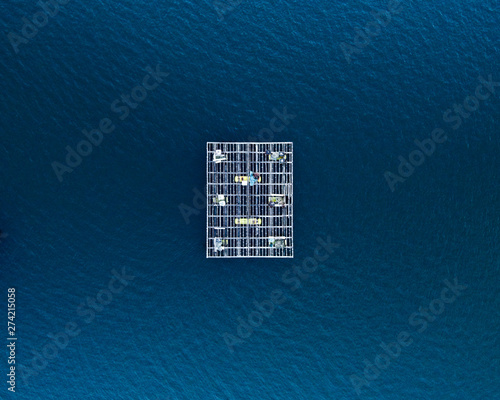 bird's eye view photo of bateas in Ria de Arousa, O Grove, Galicia. Shellfish and mussel farm.