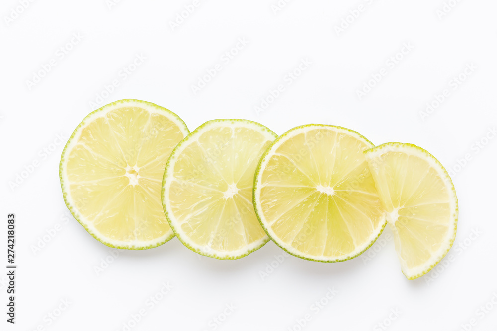 Composition with fresh ripe limes on light background, top view Composition with fresh ripe limes on light background, top view